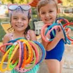 Kids playing with pool toys