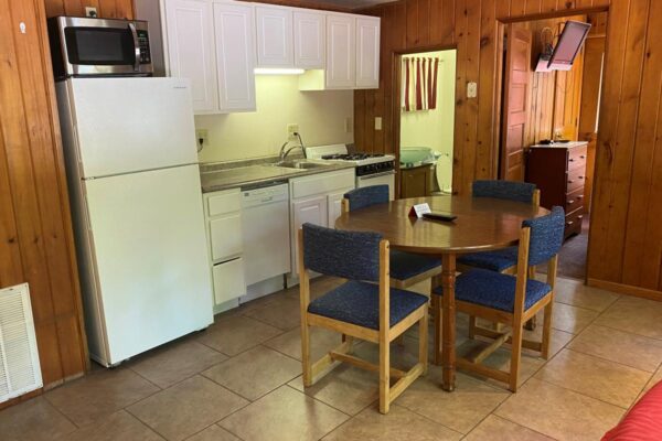 View of the dining table and kitchen