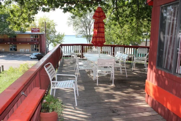 View of the patio with a lake view