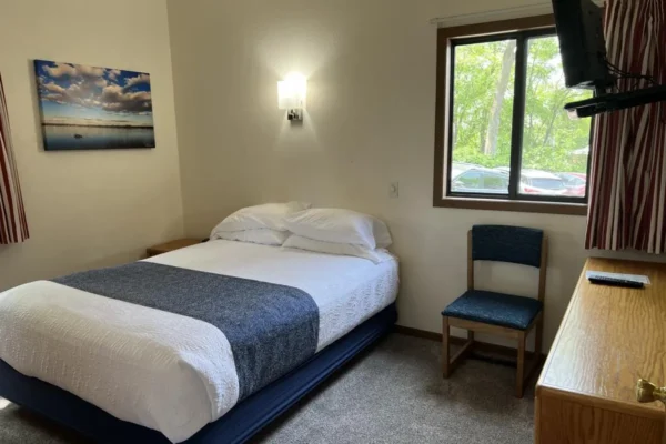 View of the third bedroom with a queen bed