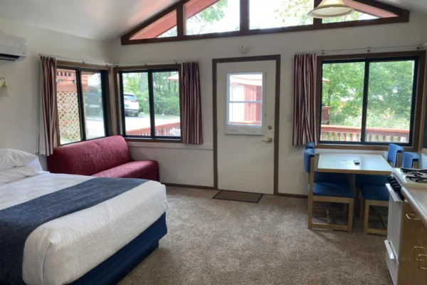 Main room with queen bed and sofa sleeper