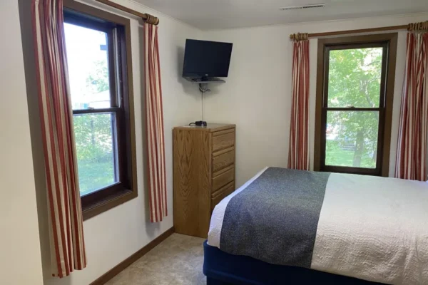 View of the second bedroom with a queen bed