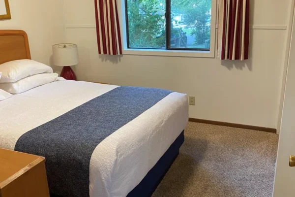 View of the second bedroom with a queen bed